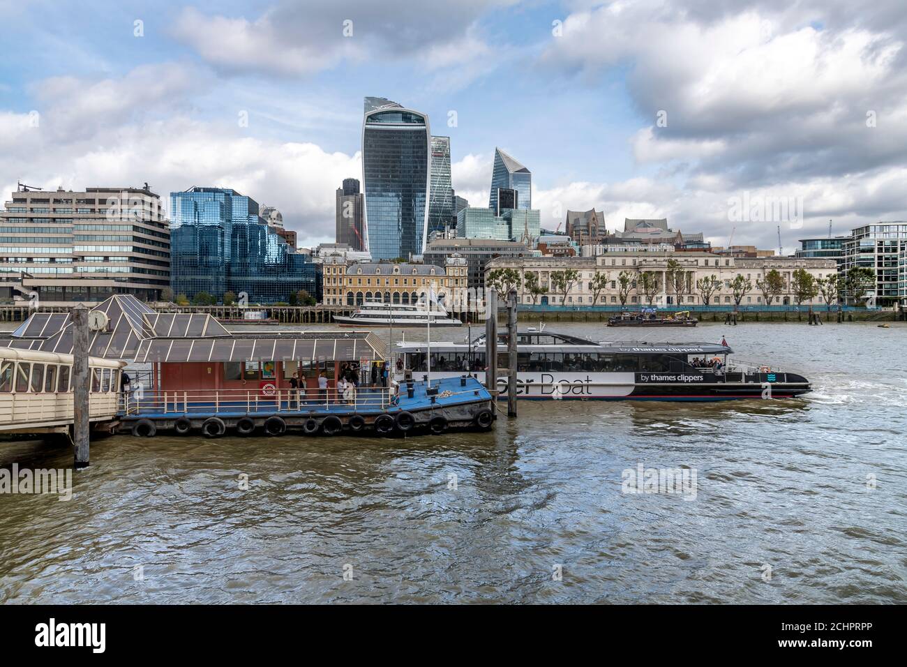 London cityscape, shot from the Southbank. The well-known buildings shown are NatWest Tower, Cheesegrater, The Scalpel and the Walkie Talkie. Stock Photo