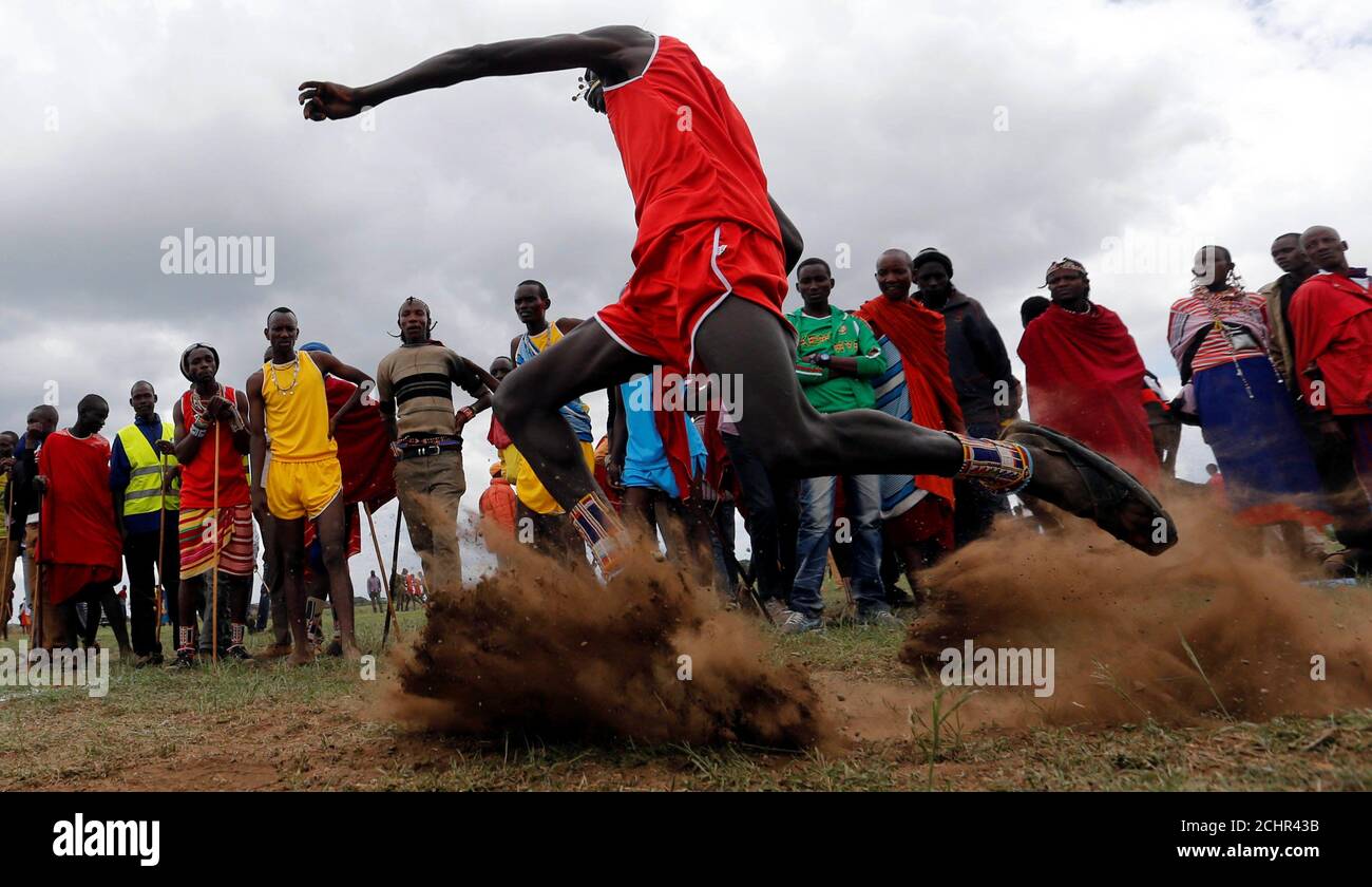 A Maasai Moran From The Olgulului Manyatta Throws A Javelin As He Competes In The 2016 Maasai Olympics At The Sidai Oleng Wildlife Sanctuary At The Base Of Mt Kilimanjaro Near The