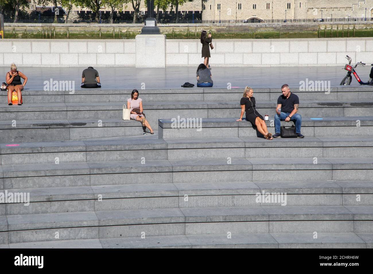 London, UK 14 Sept 2020 - Fewer people enjoy the warm and sunny weather in More London during lunchtime as the mini heatwave continues in the capital. More London and nearby Potters Field Park would normally be very busy with tourists and office workers during sunny weather. The government has announced that gatherings of more than six people are banned from today as the numbers of COVID19 cases have started to increase. Credit Dinendra Haria /Alamy Live News Stock Photo