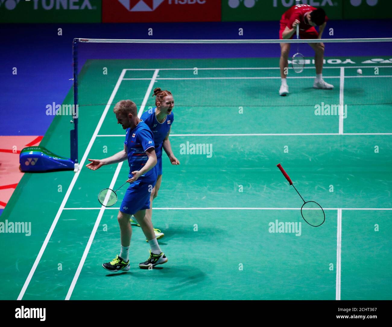 Badminton - All England Open Badminton Championships - Arena Birmingham,  Birmigham, Britain - March 6, 2019 England's Marcus Ellis and Lauren Smith  celebrate winning their first round match against China's Jiting He