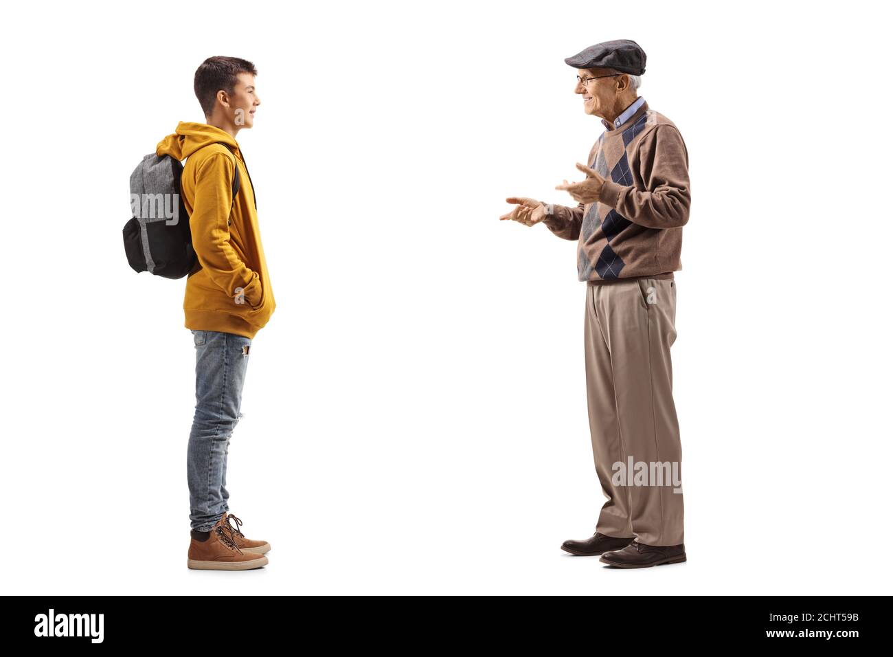 Full length profile shot of an elderly man talking to his teenage grandson isolated on white background Stock Photo