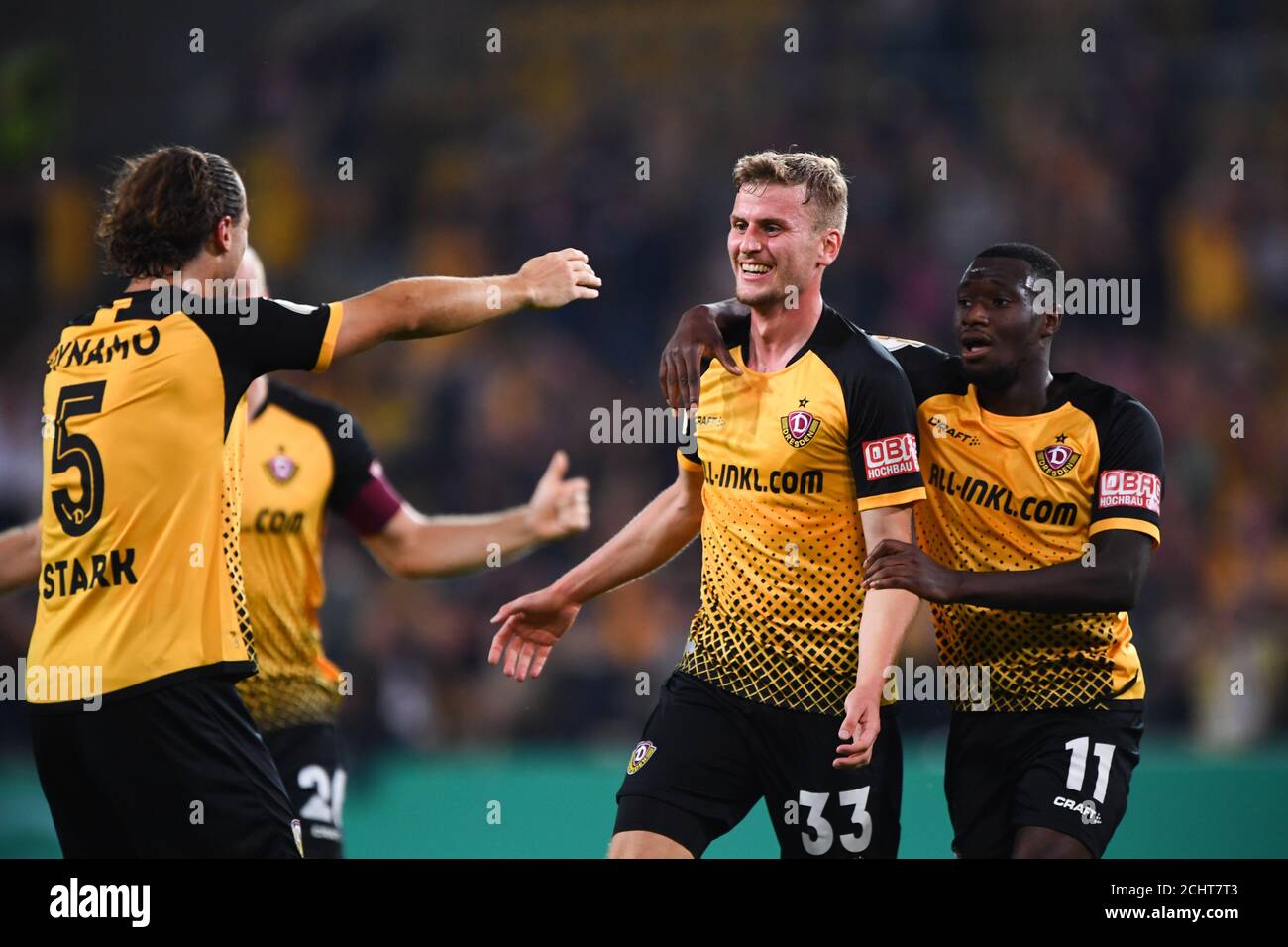 Dresden, Germany. 23rd July, 2022. Soccer: 3rd league, SG Dynamo Dresden - TSV  1860 Munich, Matchday 1, Rudolf Harbig Stadium. Dynamo's Kevin Ehlers  (l-r), Tim Knipping and Dennis Borkowski emotional. Credit: Robert