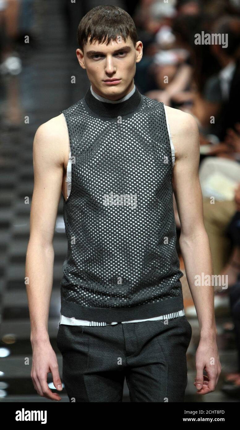 A model presents a creation as part of the Prada Spring/Summer 2010 men's  collection during Milan Fashion Week June 22, 2009. REUTERS/Stefano  Rellandini (ITALY FASHION Stock Photo - Alamy