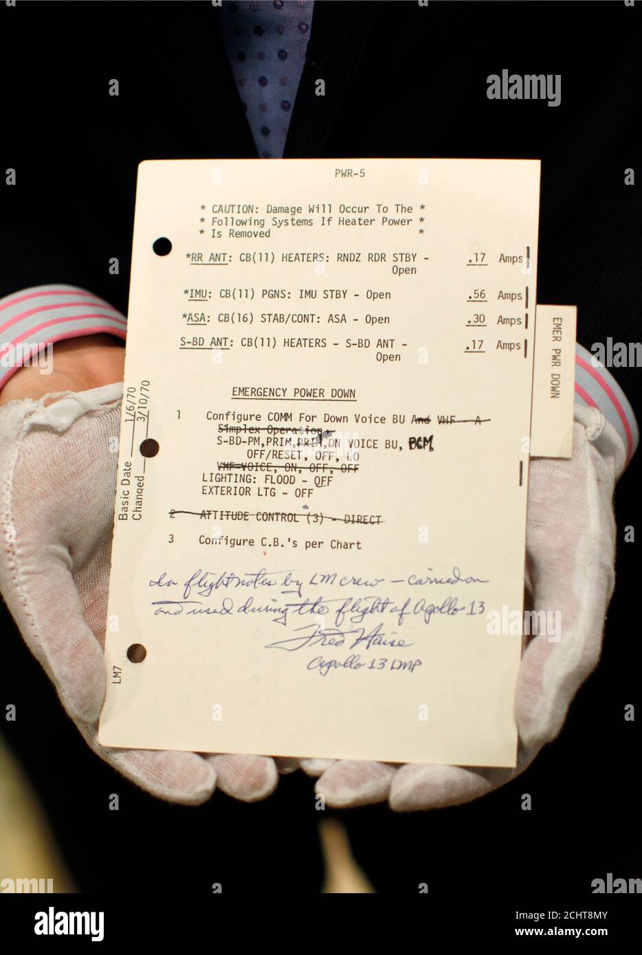 The emergency check list from Apollo 13 signed by lunar module pilot Fred Haise is shown at Bonham's Auction house in New York, April 9, 2010. Bonham's will host the Space History Sale April 13, 2010.  REUTERS/Brendan McDermid (UNITED STATES - Tags: SCI TECH SOCIETY) Stock Photo