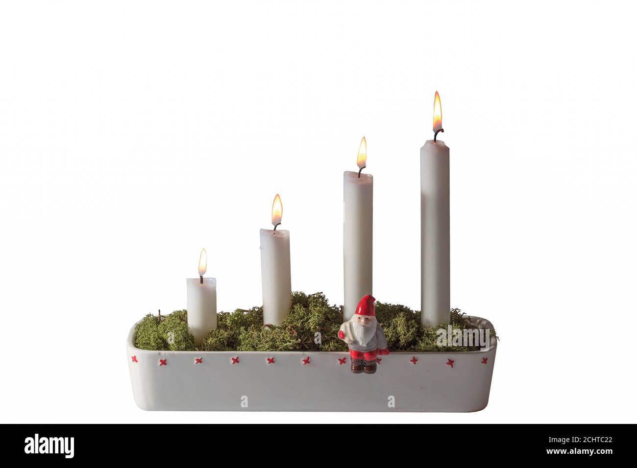 Close up view of advent candlestick decorated with little figure of Santa  Clause and green moss Stock Photo - Alamy