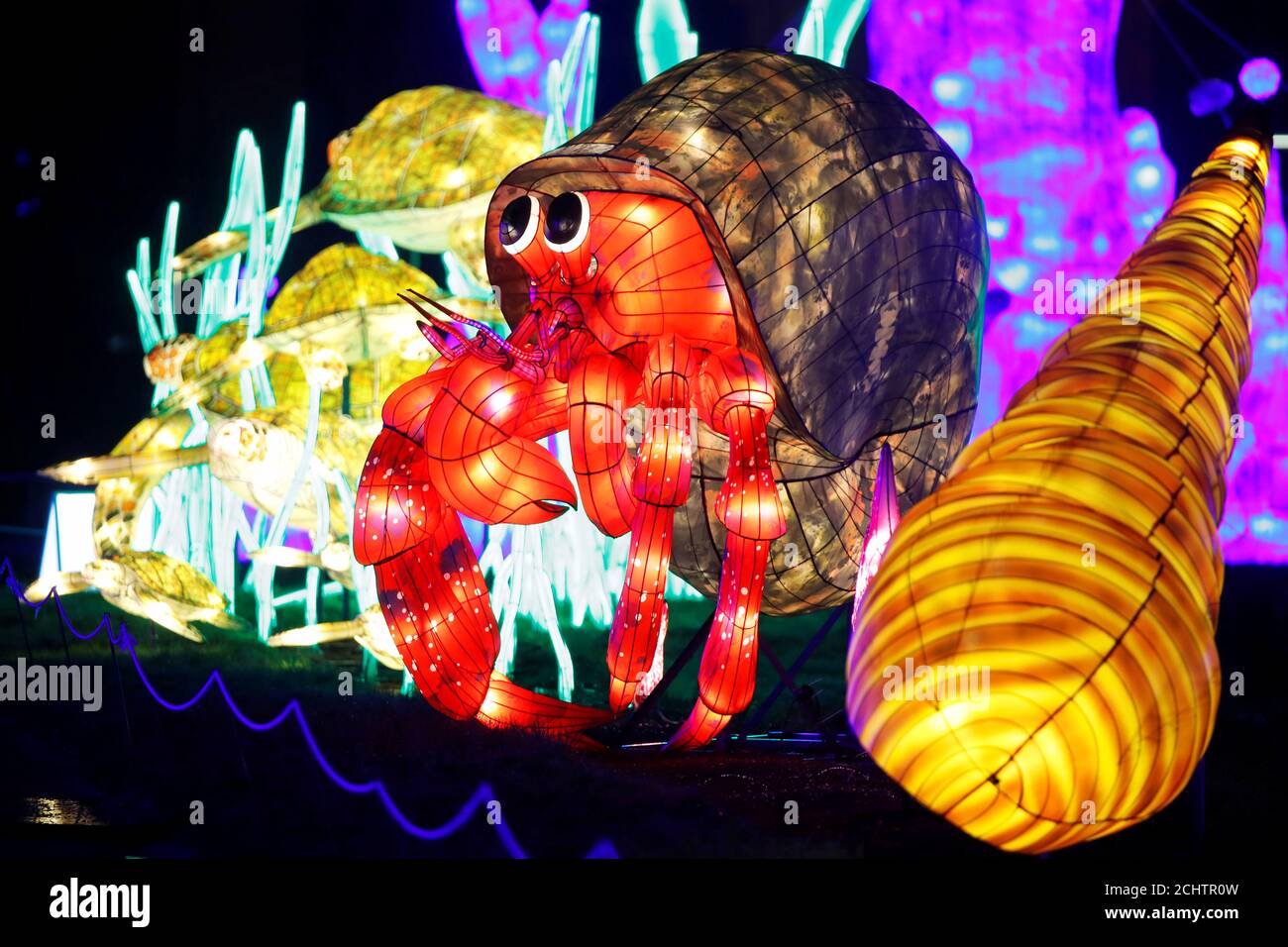 Brightly coloured animal-shaped figures are on display during the "Ocean en  voie d'illumination" exhibition at the Jardin des Plantes (Botanical  garden) in Paris, France, November 15, 2019. Artisans from Zigong City in