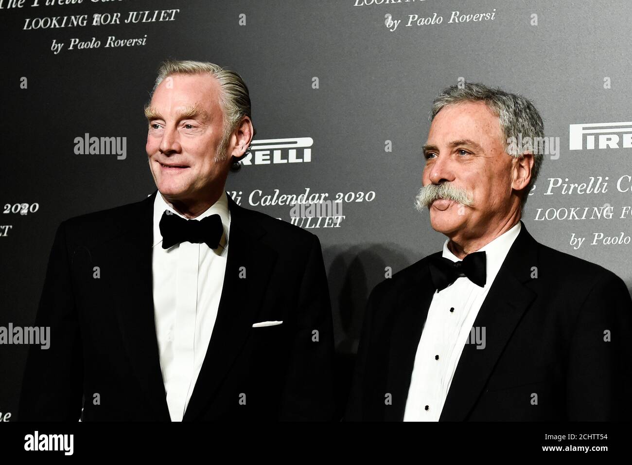Formula One group CEO, Chase Carey, and Managing Director of Commercial Operations Sean Bratches pose at the launch of the 'Looking for Juliet' 2020 Pirelli Calendar, in the northern Italian city of Verona, Italy December 3, 2019. REUTERS/Flavio Lo Scalzo Stock Photo
