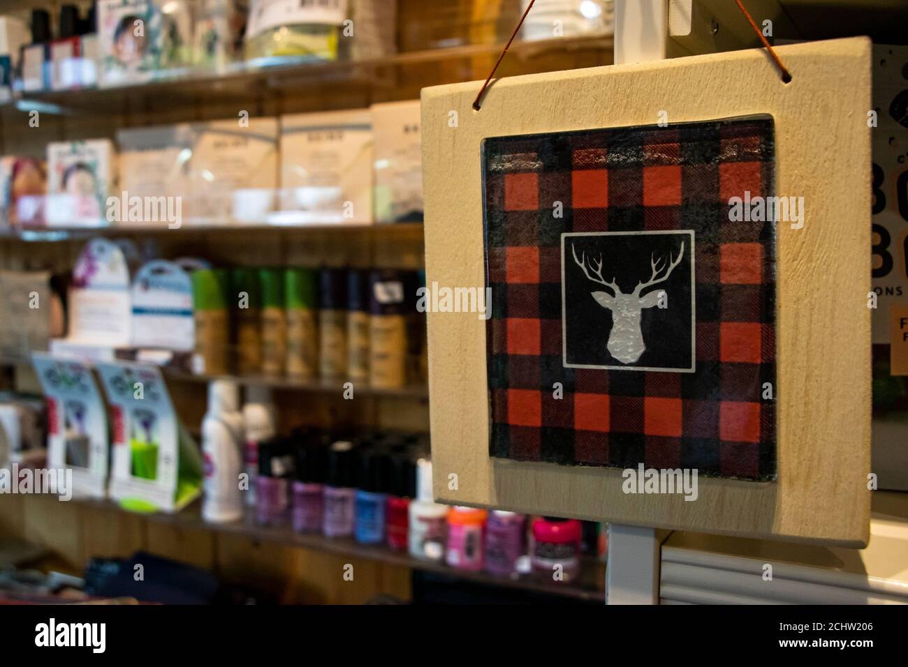 September 12, 2020 - Shawinigan, Qc, Canada: Red Buffalo Plaid Deer Head Frame in a gift shop in Québec Stock Photo