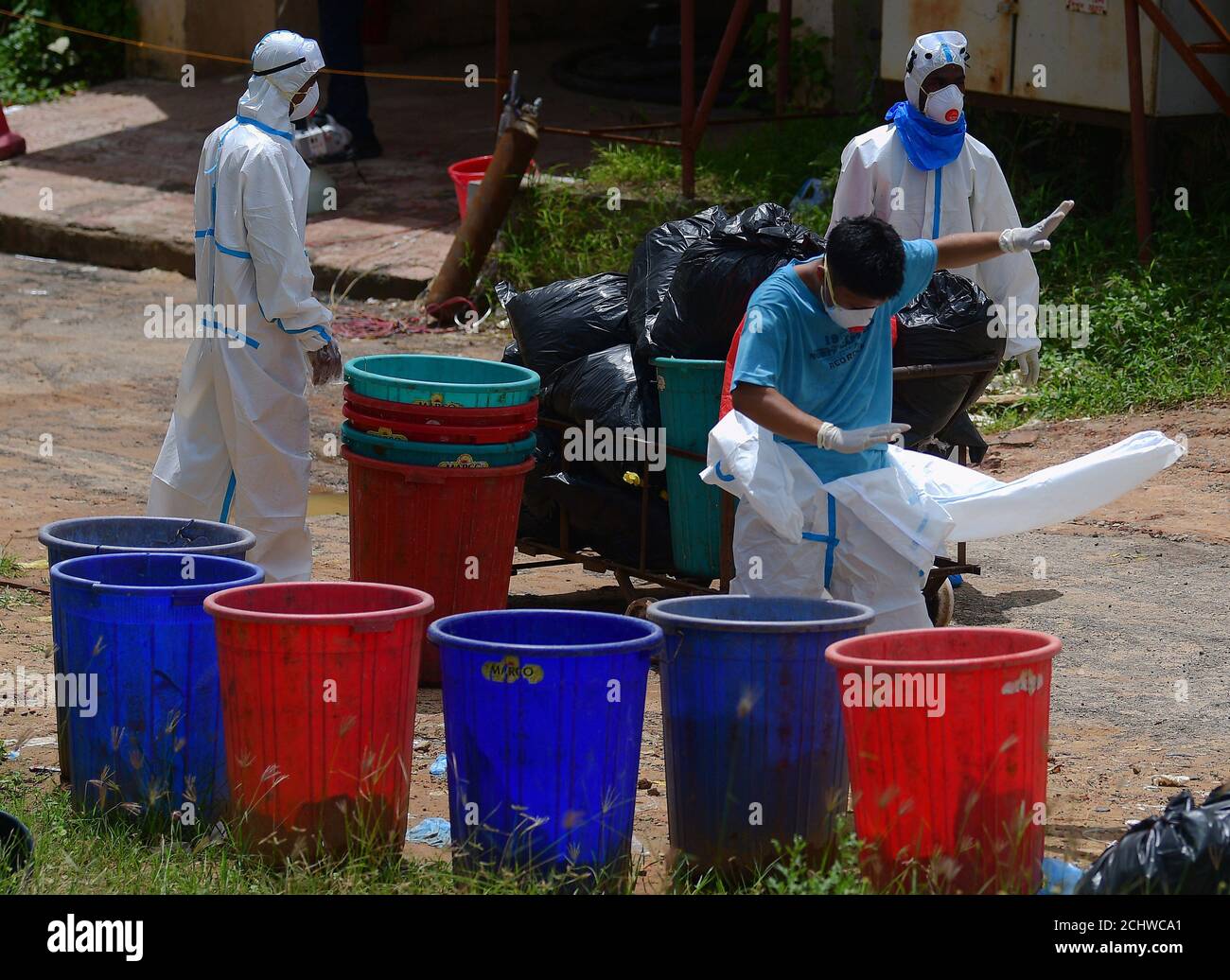 Medical staff removing their Personal Protective Equipment (PPE) kits