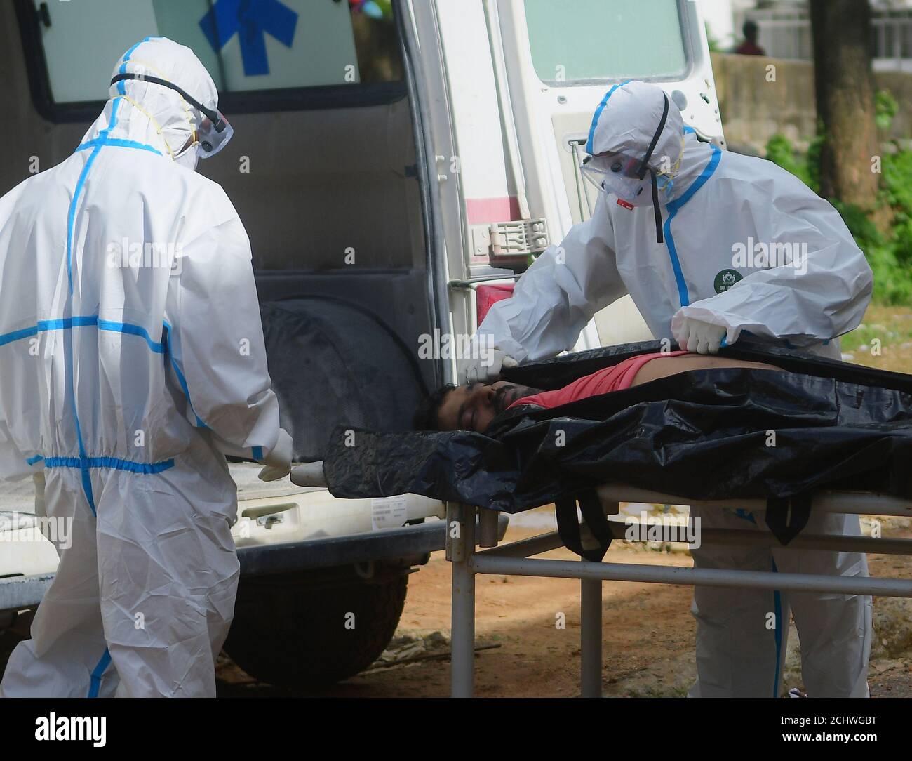 A person has died due to the coronavirus. Medical staff wearing