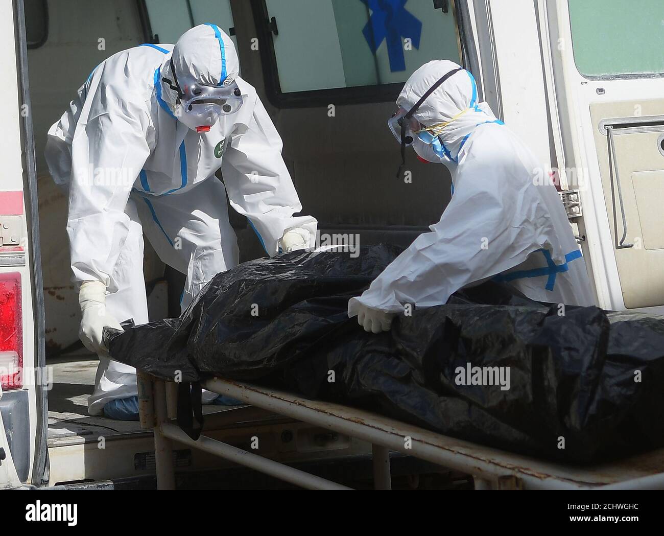 A person has died due to the coronavirus. Medical staff wearing