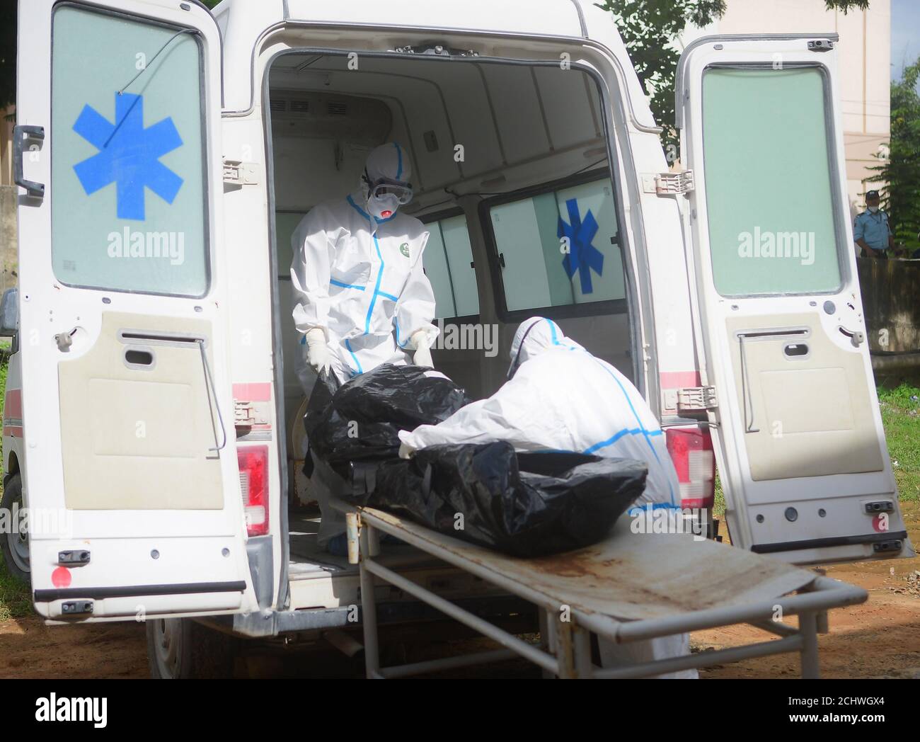 A person has died due to the coronavirus. Medical staff wearing