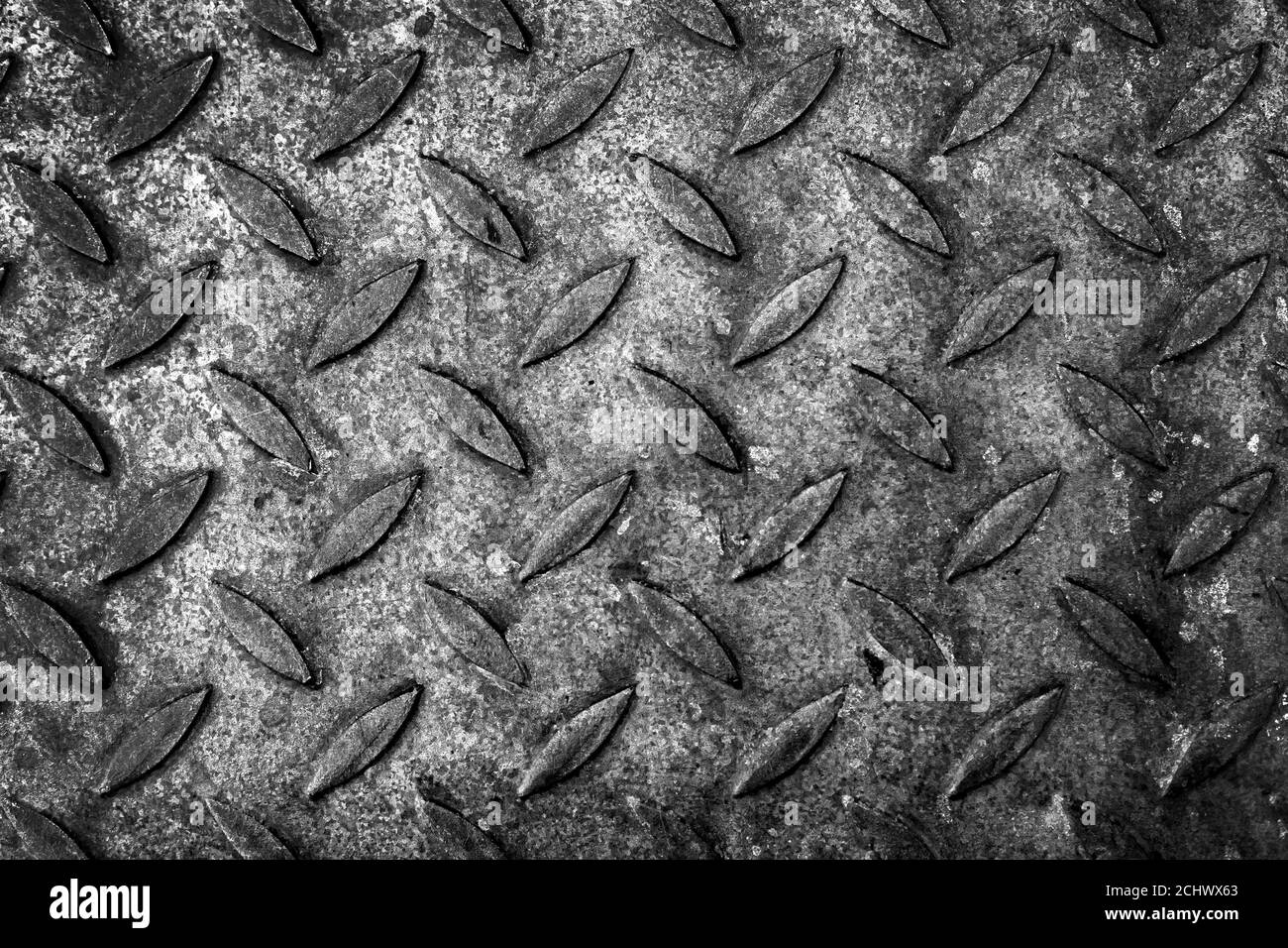 Old diamond plate pattern, metal flooring texture. Background black and  white photo texture Stock Photo - Alamy