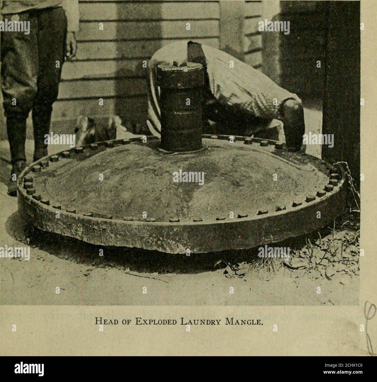 . The Locomotive . Devoted to Power Plant Protection Published Quarterly Vol. XXXIII. HARTFORD, CONN., OCTOBER, 1921. No. 8 COPYRIGHT. 1921, BY THE HARTFORD STEAM BOILER INSPECTION AND INSURANCE CO.. Head of Exploded Laundry Mangle, 226 THE LOCOMOTIVE. [October, Explosion of a Laundry Mangle. The guests of the Hotel Pemberton and the residents of Hull,Mass., had an element of terror injected into their peaceful summerlife on August nth by the explosion of a mangle in the laundry ofthe hotel. A newspaper account in The Boston Post for August 12thstated that the explosion wrecked the laundry, to Stock Photo