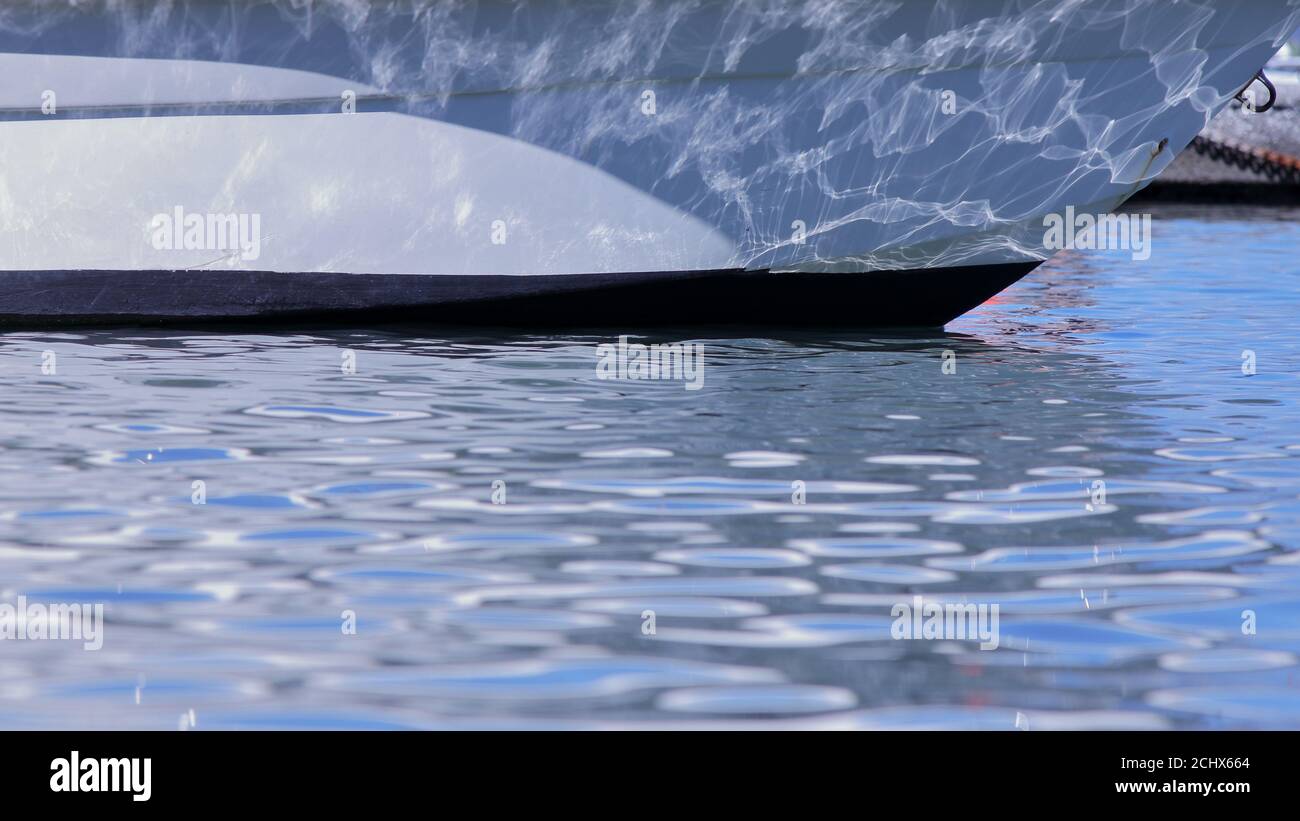 reflection of the waves on the hull of a boat Stock Photo - Alamy