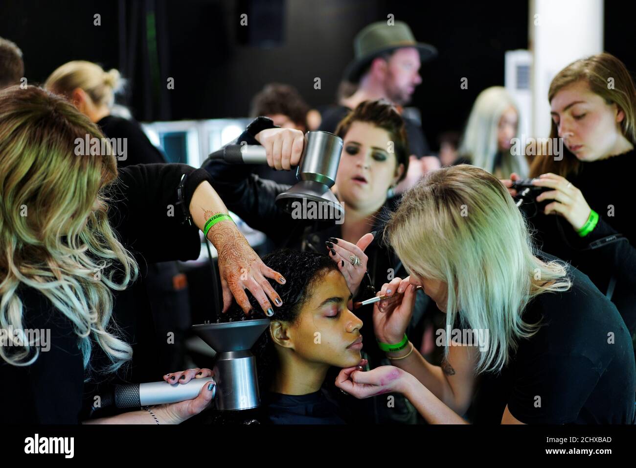 Models prepare backstage of the Roberta Einer catwalk show at London Fashion Week Women's A/W19 in London, Britain February 19,  2019. REUTERS/Henry Nicholls Stock Photo