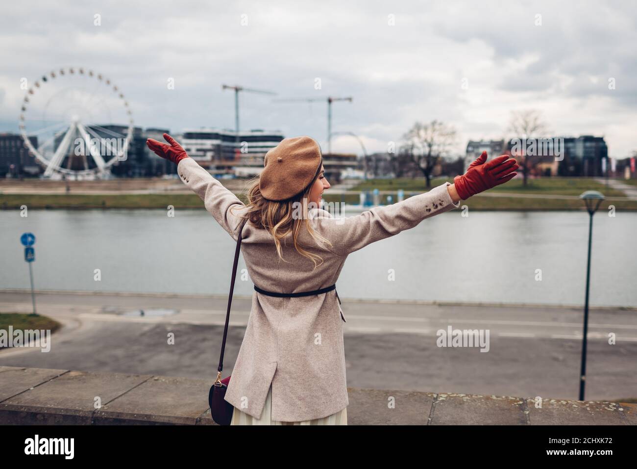 Happy tourist woman enjoying hi-res stock photography and images - Alamy