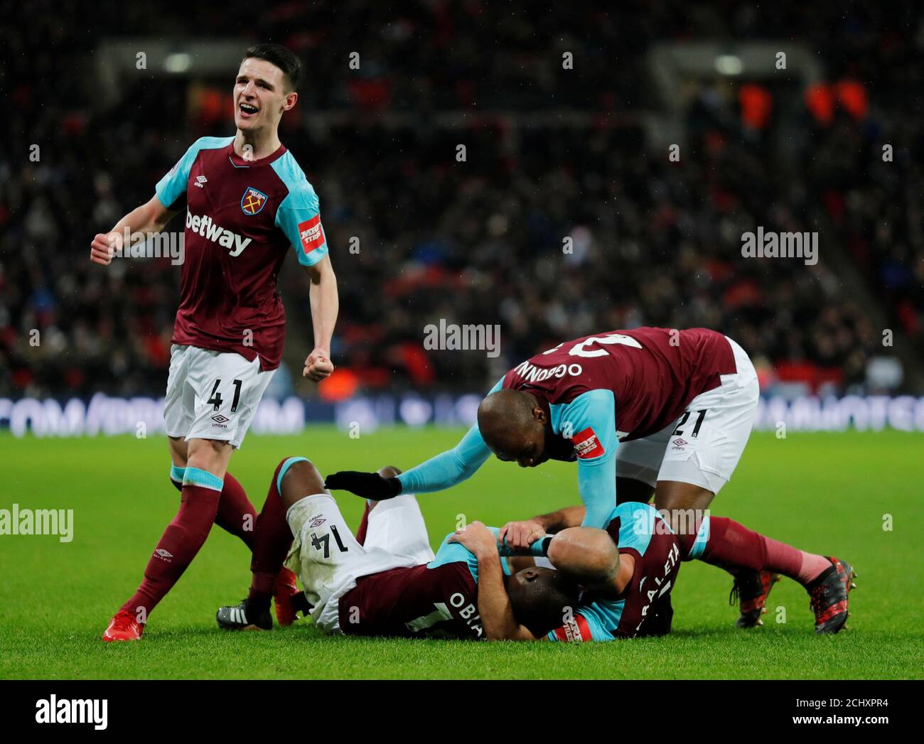 Soccer Football - Premier League - Tottenham Hotspur vs West Ham United - Wembley Stadium, London, Britain - January 4, 2018   West Ham United's Pedro Obiang celebrates scoring their first goal with Declan Rice, Pablo Zabaleta and Angelo Ogbonna    REUTERS/Eddie Keogh    EDITORIAL USE ONLY. No use with unauthorized audio, video, data, fixture lists, club/league logos or 'live' services. Online in-match use limited to 75 images, no video emulation. No use in betting, games or single club/league/player publications.  Please contact your account representative for further details. Stock Photo
