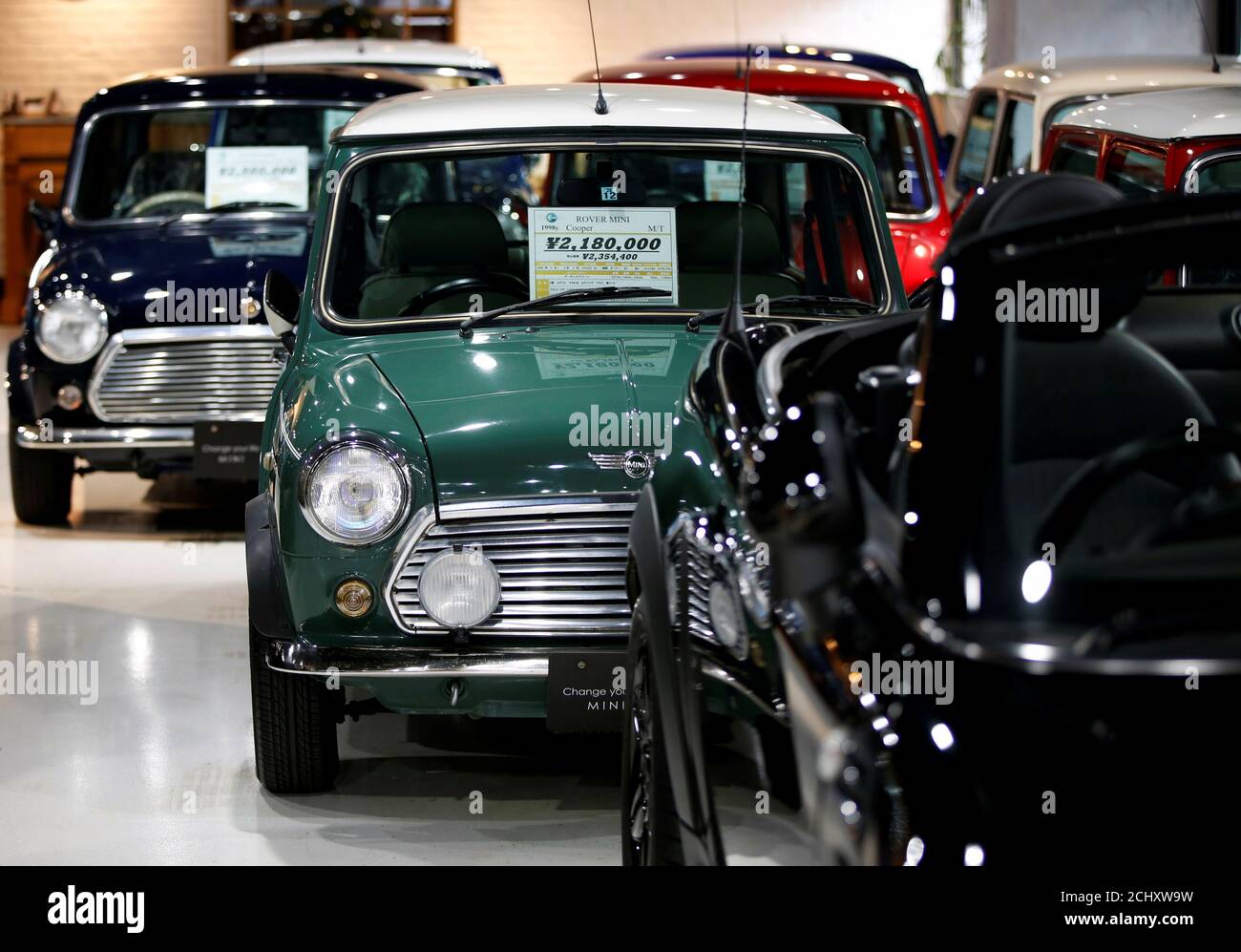 Rover Mini Cooper, Rover Mini Mayfair and Rover Mini Paul Smith cars are  displayed at the showroom of the "iR", a used Mini car dealer, in Tokyo,  Japan December 13, 2018. REUTERS/Issei
