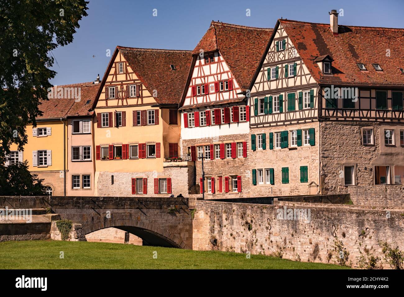 Historic half-timbered houses on Steinernen Steg in the old town of Schwaebisch Hall in Baden-Wuerttemberg Stock Photo