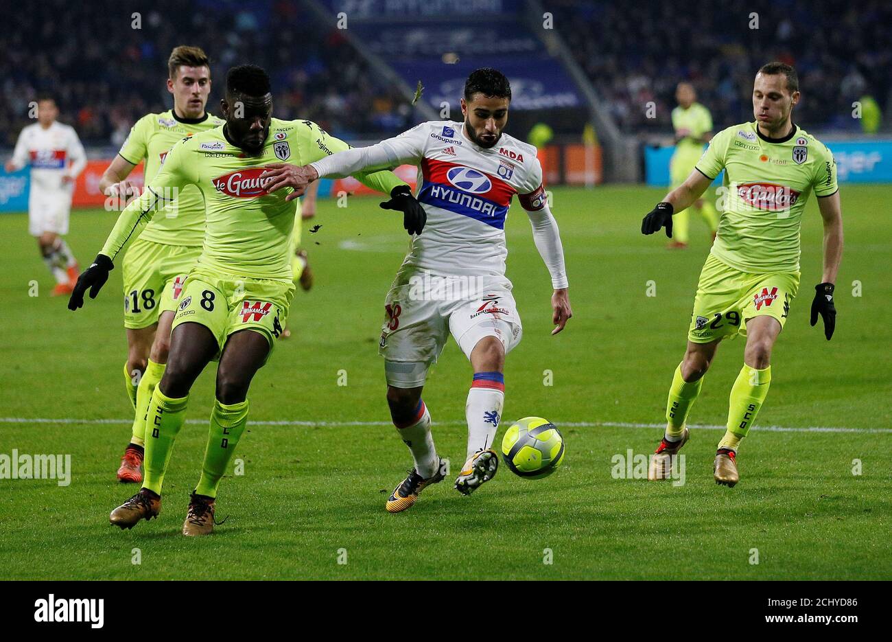Soccer Football Ligue 1 Olympique Lyonnais Vs Angers Groupama Stadium Lyon France January 14 2018 Lyon S Nabil Fekir In Action With Angers Ismael Traore And Vincent Manceau Reuters Robert Pratta Stock Photo Alamy