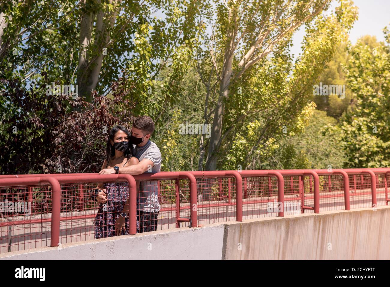 Interracial couple wearing medical masks hi-res stock photography and ...
