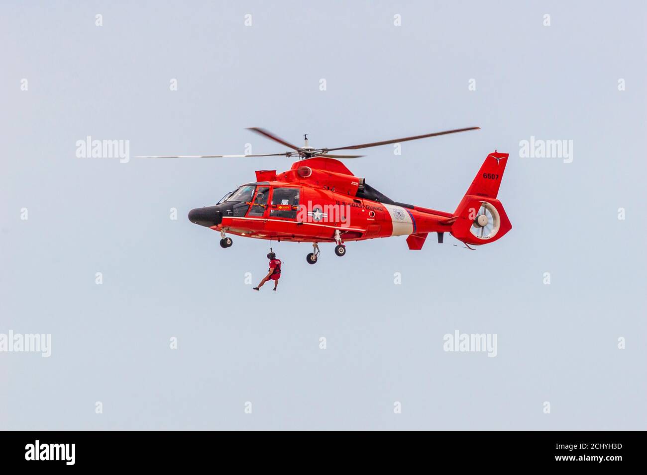 6518 MH-65 Dolphin Helicopter rescue demonstration at Wings Over Houston Air Show Stock Photo