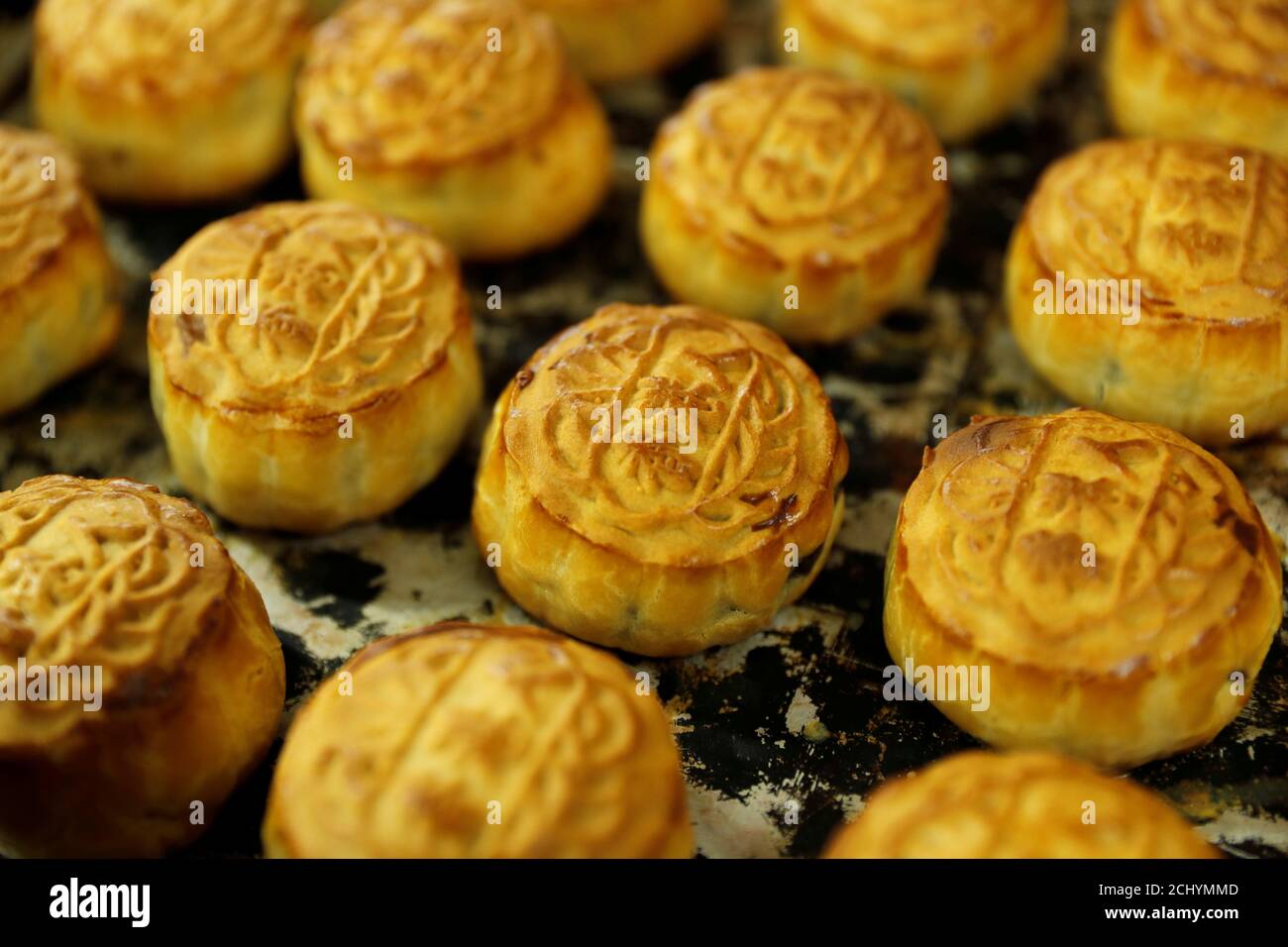 Mooncakes with Chinese words 'Hongkonger' are seen at Wah Yee Tang Bakery in Hong Kong, China July 12, 2019. REUTERS/Tyrone Siu Stock Photo