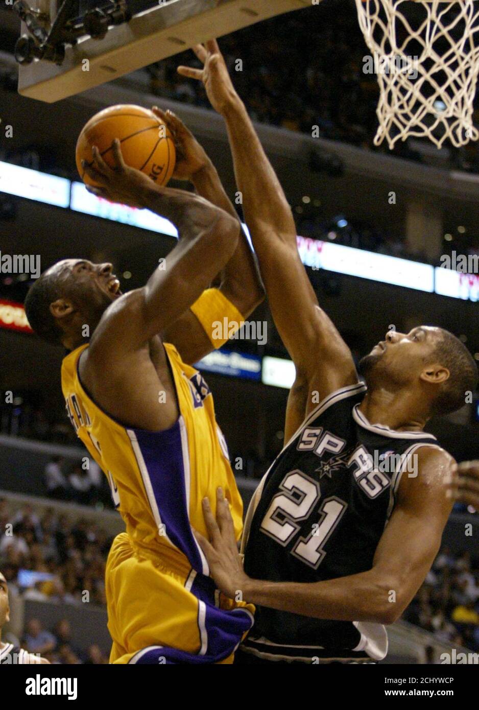 Los Angeles Lakers Kobe Bryant L Is Fouled By San Antonio Spurs Tim Duncan During First Half Action Of Their Regular Season Opening Game At The Staples Center In Los Angeles On