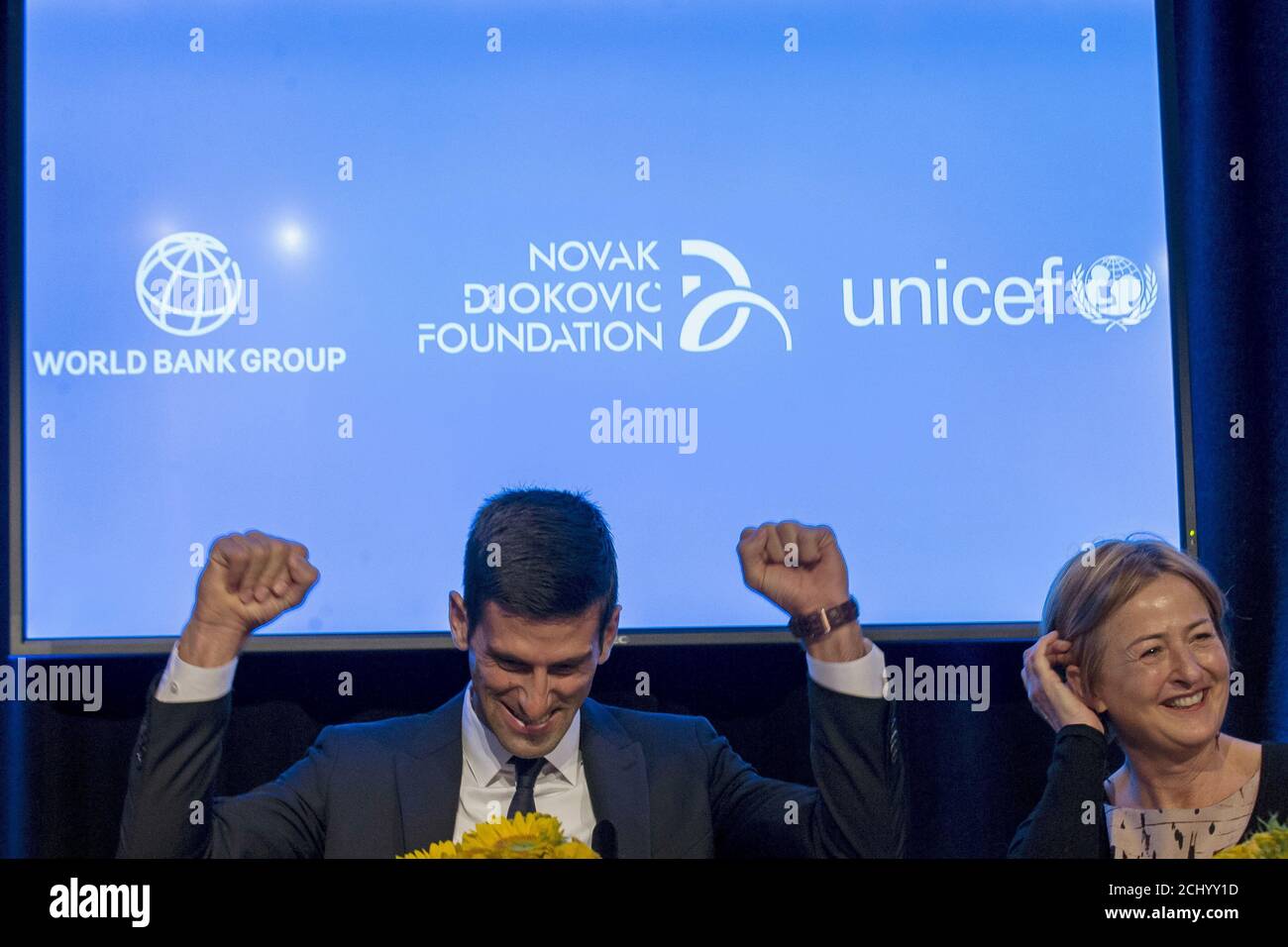 Serbian tennis player Novak Djokovic (L) reacts during a news conference at the UNICEF headquarters in New York August 26, 2015. Djokovic announced a partnership between UNICEF, the World Bank Group and the Novak Djokovic Foundation. REUTERS/Brendan McDermid Stock Photo