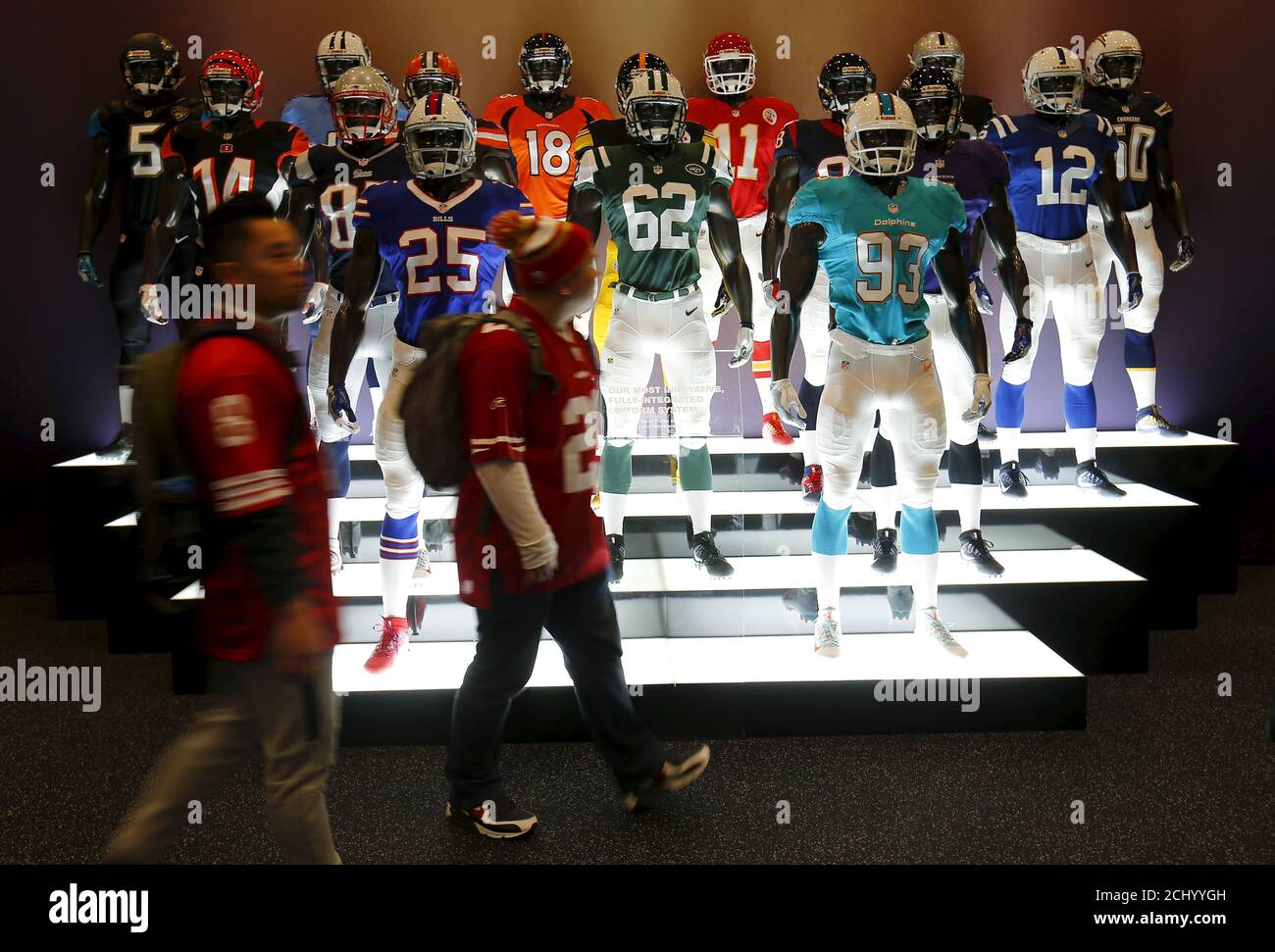 Football Fans Walk Past A Display Of Mannequins Dressed As Nfl Football Players At A Super Bowl 50 Retail Venue In San Francisco Football Fans Walk Past A Display Of Mannequins Dressed As Nfl Football Players At A Super Bowl 50 Retail Venue In San Francisco