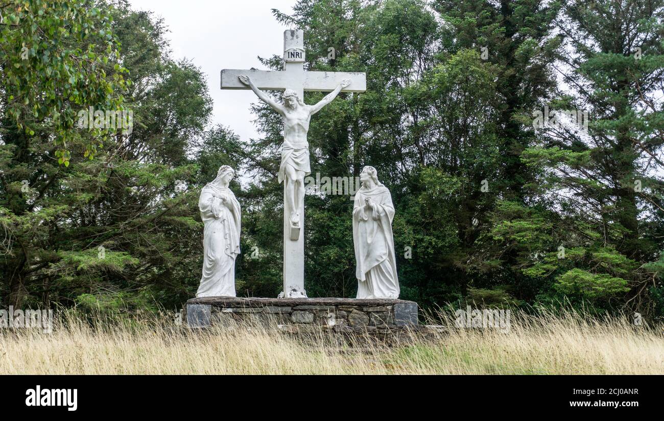 A roadside shrine of The Crucifixion of our Lord on the Ring of Kerry in Ireland. Stock Photo