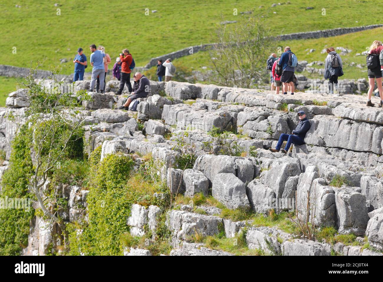 Limestone pavements above Malham Cove in the Yorkshire Dales National Park. Stock Photo
