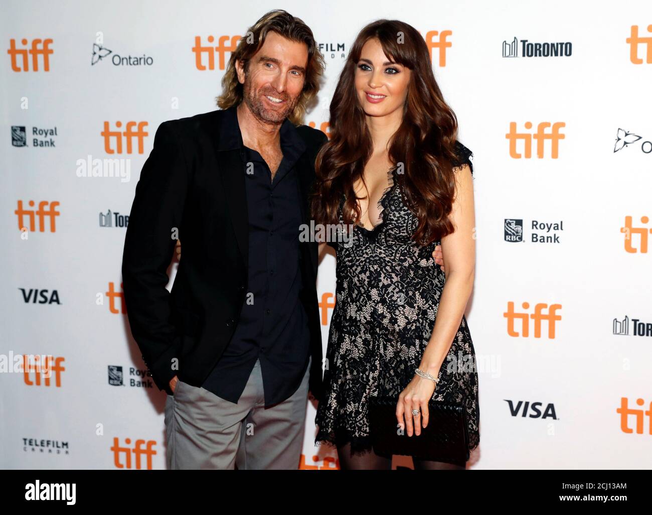 Sharlto Copley arrives with his wife, model Tanit Phoenix, on the red  carpet for the film "Free Fire" during the 41st Toronto International Film  Festival (TIFF), in Toronto, Canada, September 8, 2016.
