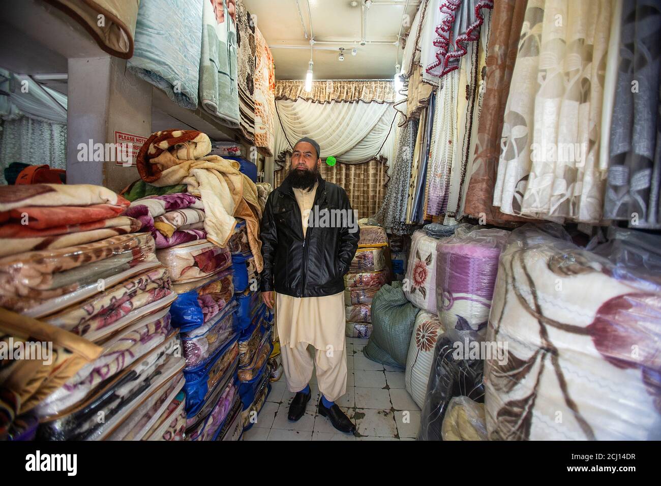 Indian male selling traditional African blankets in Johannesburg, South