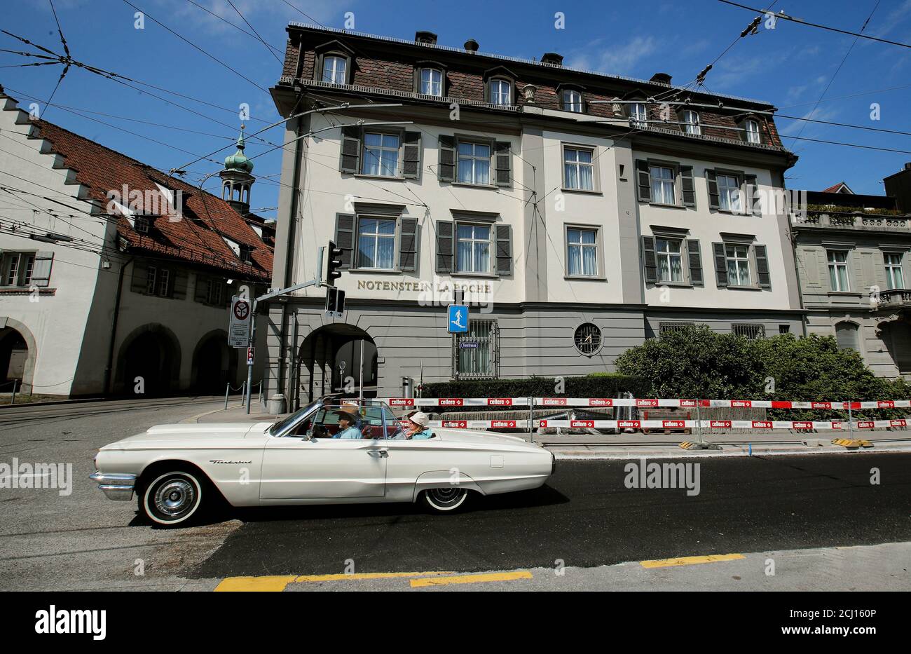 A vintage Ford Thunderbird car drives past the headquarters of Swiss  private bank Notenstein La Roche in St. Gallen, Switzerland July 14, 2018.  Picture taken July14, 2018. REUTERS/Arnd Wiegmann Stock Photo - Alamy