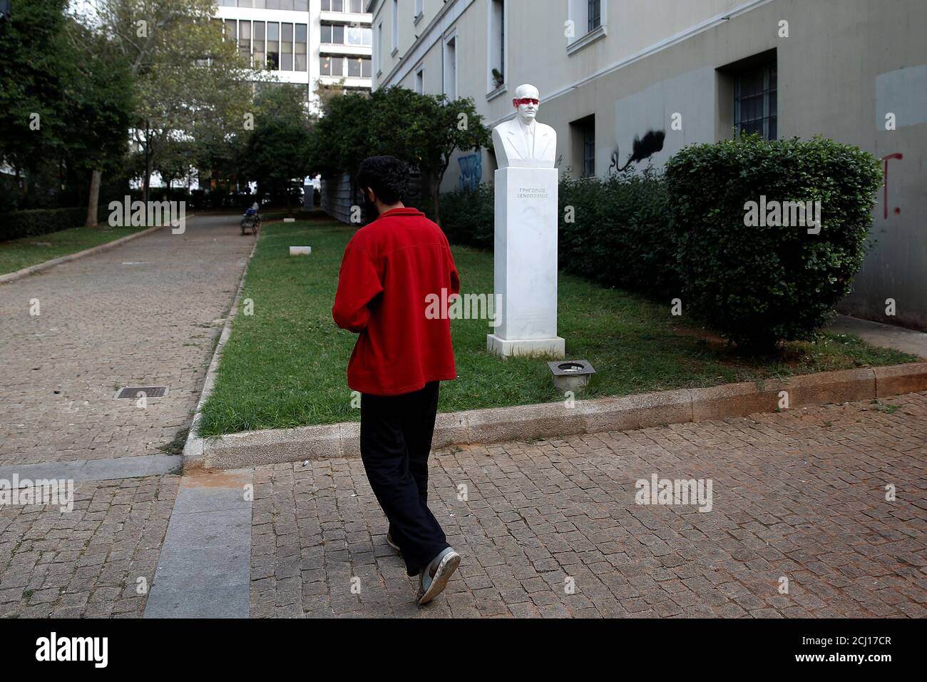A heroin addict, who didn't want to be identified, walks near the University of Athens Law School building in Athens, Greece, October 24, 2018. REUTERS/Costas Baltas Stock Photo