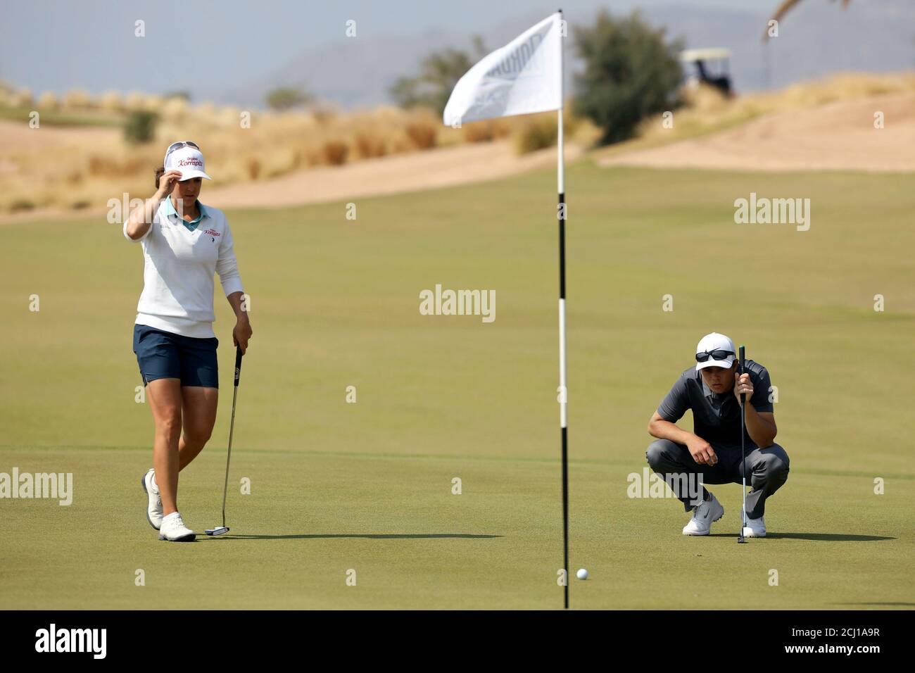 Shergo Al Kurdi of Jordan and Christine Wolf of Austria play during the  second round of