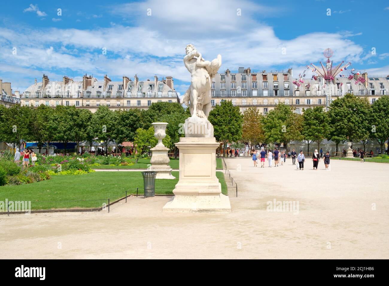 Parisians enjoying summer at the Tuileries Garden in Paris Stock Photo