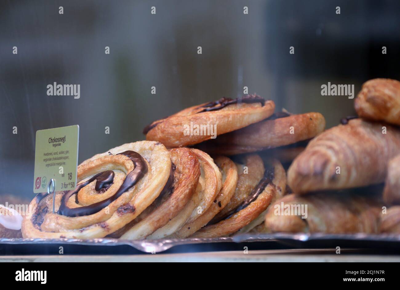 Danish pastries in a bakery window Stock Photo - Alamy