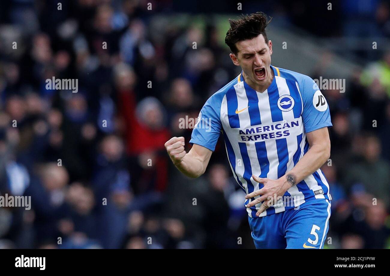 Soccer Football - Premier League - Brighton & Hove Albion vs Arsenal - The American Express Community Stadium, Brighton, Britain - March 4, 2018   Brighton's Lewis Dunk celebrates at full time     REUTERS/Eddie Keogh    EDITORIAL USE ONLY. No use with unauthorized audio, video, data, fixture lists, club/league logos or 'live' services. Online in-match use limited to 75 images, no video emulation. No use in betting, games or single club/league/player publications.  Please contact your account representative for further details. Stock Photo