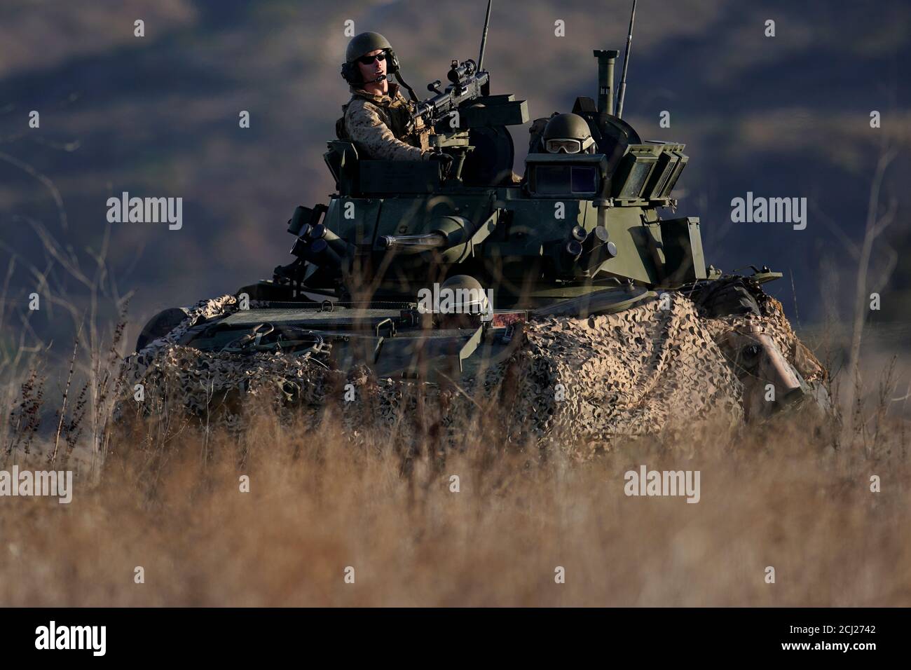 Marines from the 1st Marine Division secure the perimeter of a landing zone as they participate in 'Exercise Steel Knight' comprising of approximately 13,000 personnel include critical combat and combat service support elements from across I Marine Expeditionary Force (MEF) at Camp Pendleton, California, U.S., December 6, 2019.   REUTERS/Mike Blake Stock Photo