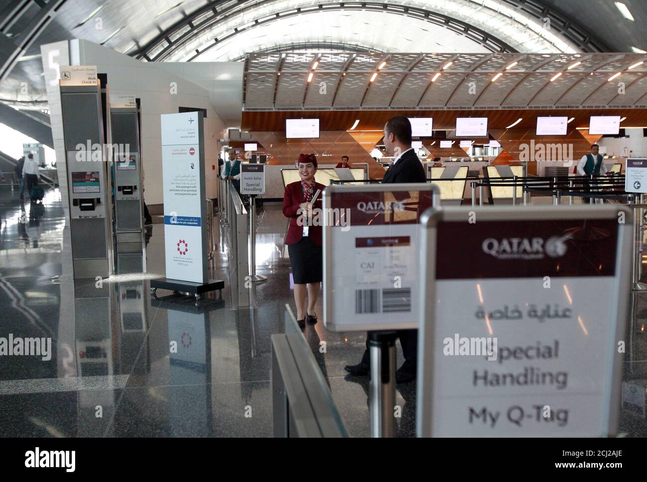 qatar airways staff high resolution stock photography and images alamy