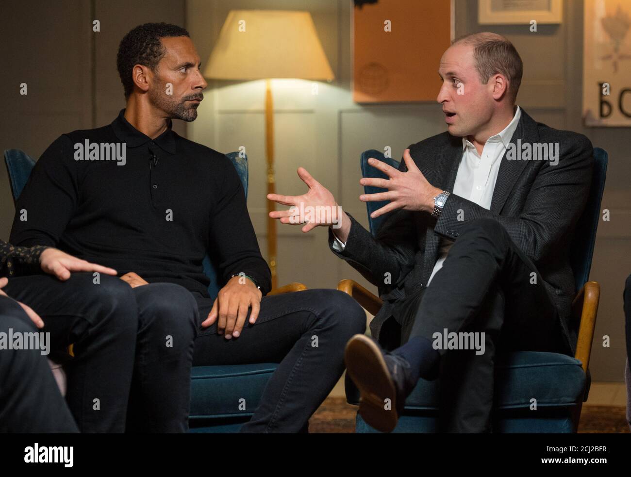 The Duke of Cambridge (R) with Rio Ferdinand during a visit to meet staff, volunteers, and supporters of 'Campaign Against Living Miserably' (CALM), a charity dedicated to preventing male suicide, to lend his support to their 'Best Man Project' at High Road House, London, Britain January 10, 2018. REUTERS/Dominic Lipinski/Pool Stock Photo