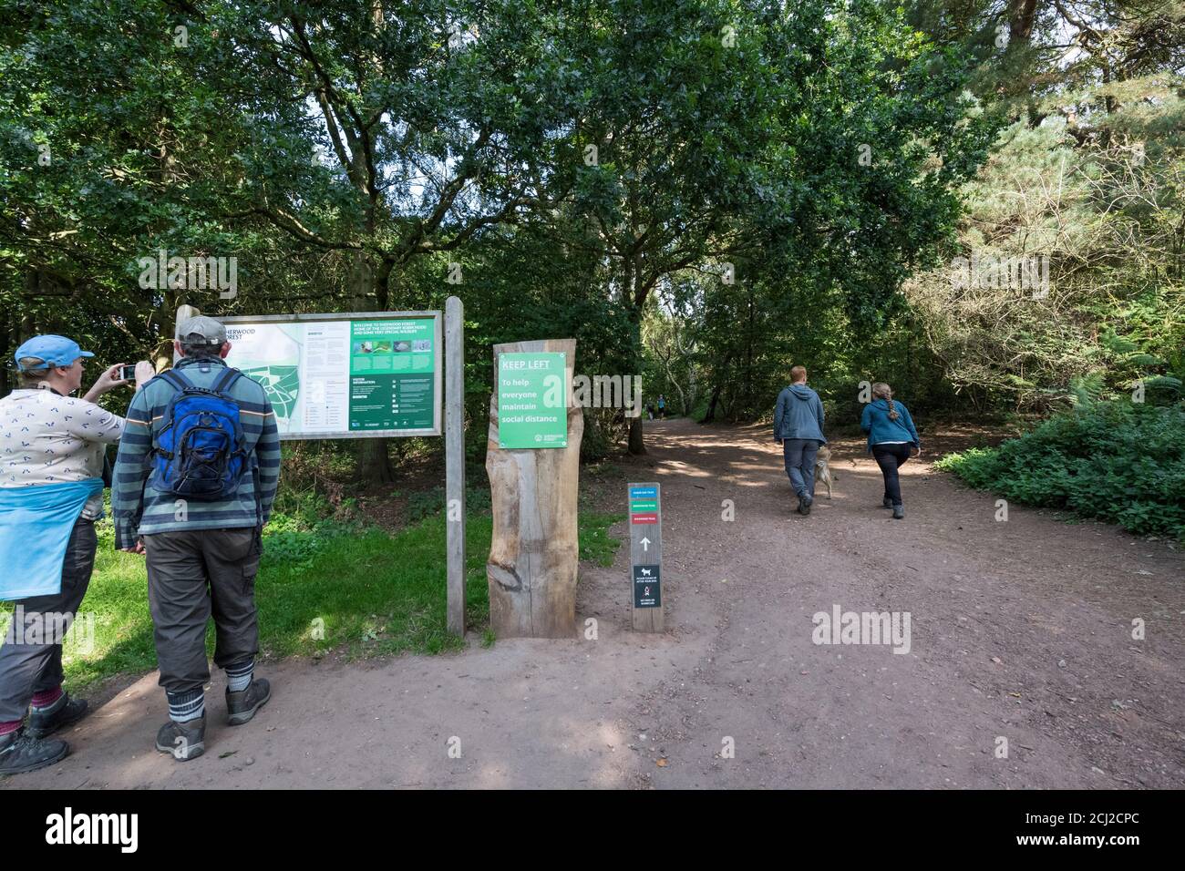 Social distance sign, 'Keep Left' at the Sherwood Forest major oak visitors centre. Stock Photo