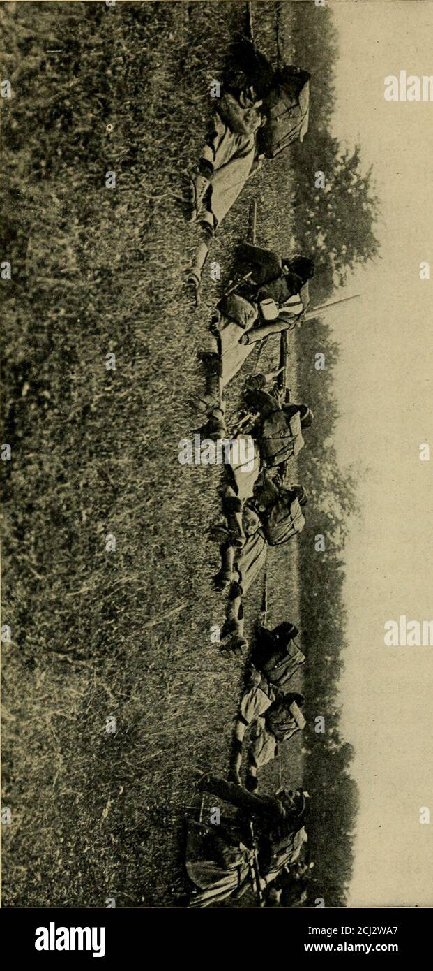 . 'Ladies from hell,' . the command of an offi-cer, to go out the following evening and put aquietus upon this obstreperous gun. We went about ten oclock, armed only withtrench-knives and revolvers. Between us wasstretched a rope, much after the fashion of Alpineclimbers. The usual code of signals had beenarranged so that the lieutenant in front could in-form any or all of us of his intentions. It wasour little job to locate the exact position of themachine-gun emplacement. It had already beenpartially located, but to make doubly sure we wereto send up a flare at the precise point in the Ger-m Stock Photo