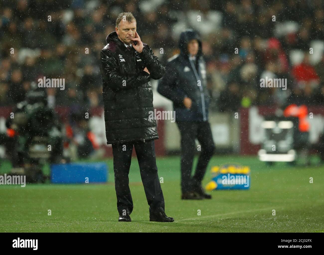 Soccer Football - Premier League - West Ham United vs West Bromwich Albion - London Stadium, London, Britain - January 2, 2018   West Ham United manager David Moyes and West Bromwich Albion manager Alan Pardew   REUTERS/Eddie Keogh    EDITORIAL USE ONLY. No use with unauthorized audio, video, data, fixture lists, club/league logos or 'live' services. Online in-match use limited to 75 images, no video emulation. No use in betting, games or single club/league/player publications.  Please contact your account representative for further details. Stock Photo