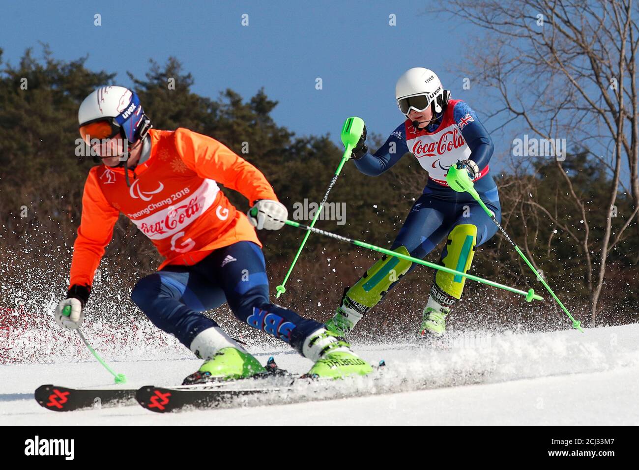 Alpine Skiing - Pyeongchang 2018 Winter Paralympics - Women's Super Combined Slalom - Visually Impaired - Jeongseon Alpine Centre - Jeongseon, South Korea - March 13, 2018 - Kelly Gallagher of Britain and her guide  REUTERS/Paul Hanna Stock Photo