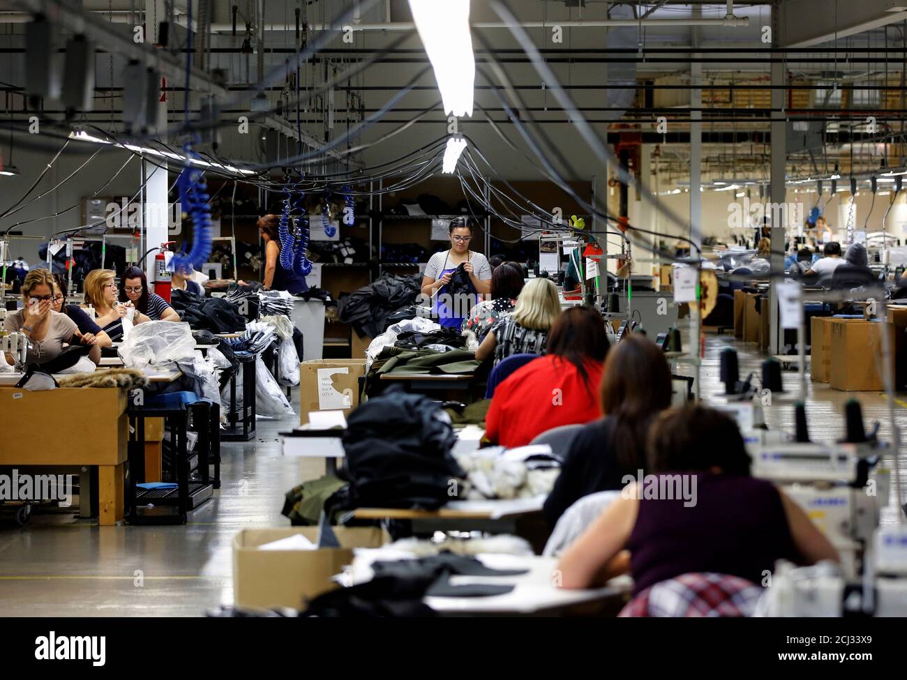 Workers make jackets at the Canada Goose factory in Toronto, Ontario, Canada,  February 23, 2018. REUTERS/Mark Blinch Stock Photo - Alamy