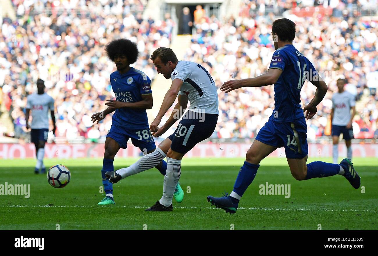 Soccer Football - Premier League - Tottenham Hotspur vs Leicester City - Wembley Stadium, London, Britain - May 13, 2018   Tottenham's Harry Kane scores their fifth goal    REUTERS/Dylan Martinez    EDITORIAL USE ONLY. No use with unauthorized audio, video, data, fixture lists, club/league logos or 'live' services. Online in-match use limited to 75 images, no video emulation. No use in betting, games or single club/league/player publications.  Please contact your account representative for further details. Stock Photo